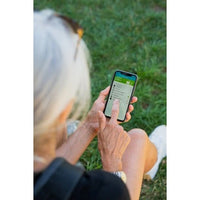 Concentratore DeVilbiss iGo2 con app SmartLink O2 sullo smartphone